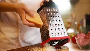 how to shred cheese with grater