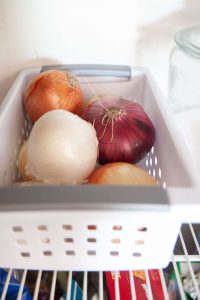 should you store onions in the fridge