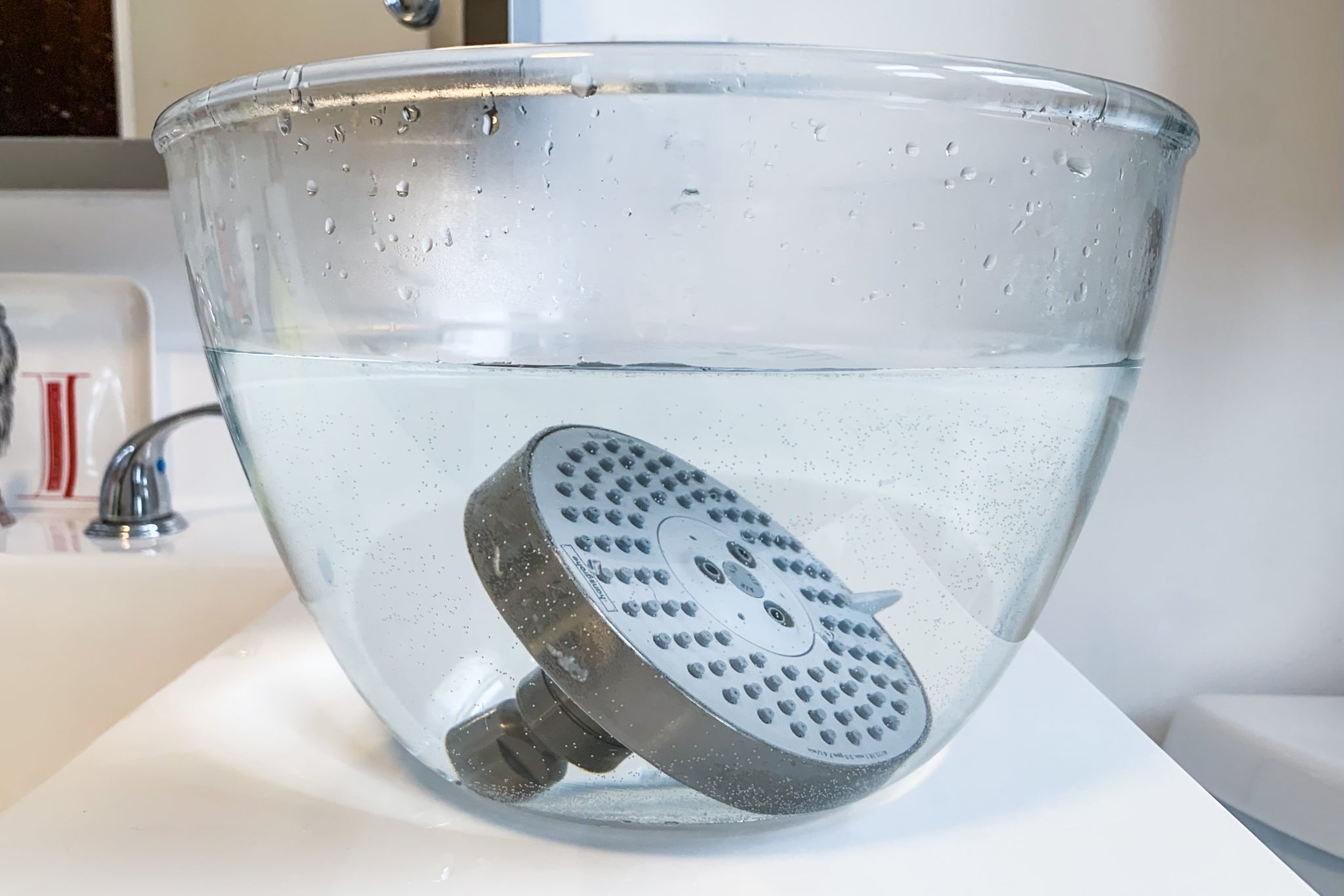 how to clean a shower head