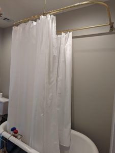 how to stick a curtain liner to plastic tub