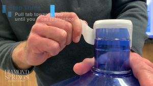 how to remove cap in the middle 5 gallon bottle