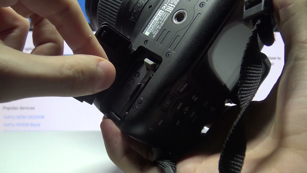 how to take battery out of canon rebel t7
