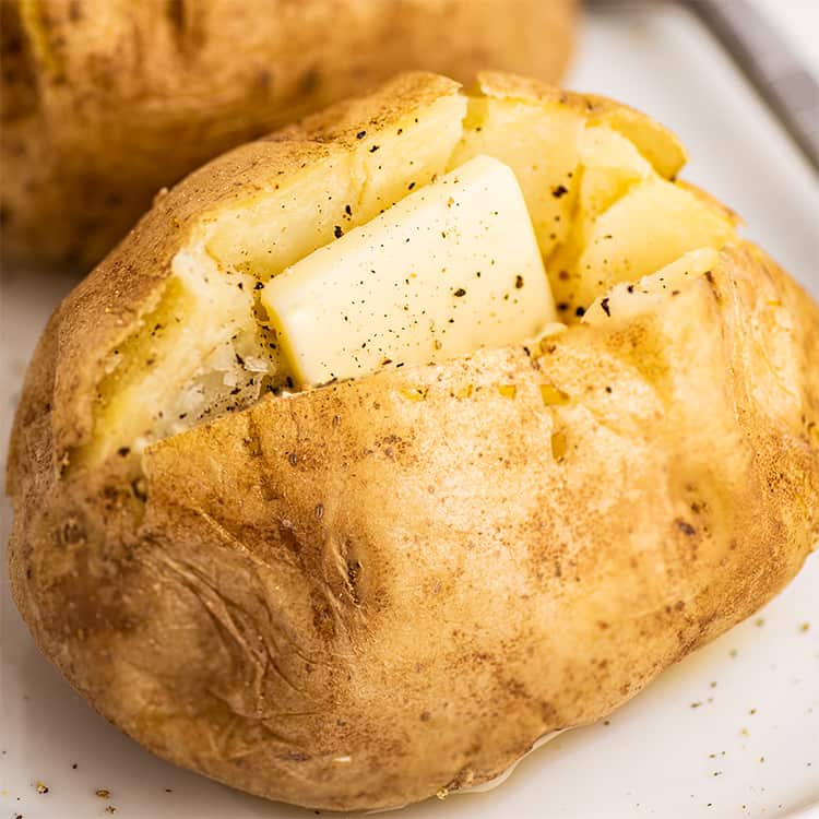 how long to microwave two potatoes