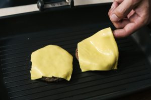 What cheese melts best on a TikTok smash burger taco?