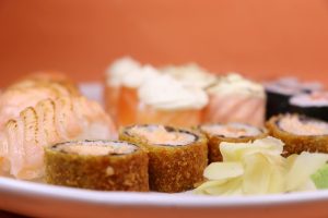 Can you use leftover cooked salmon for crispy rice sushi?