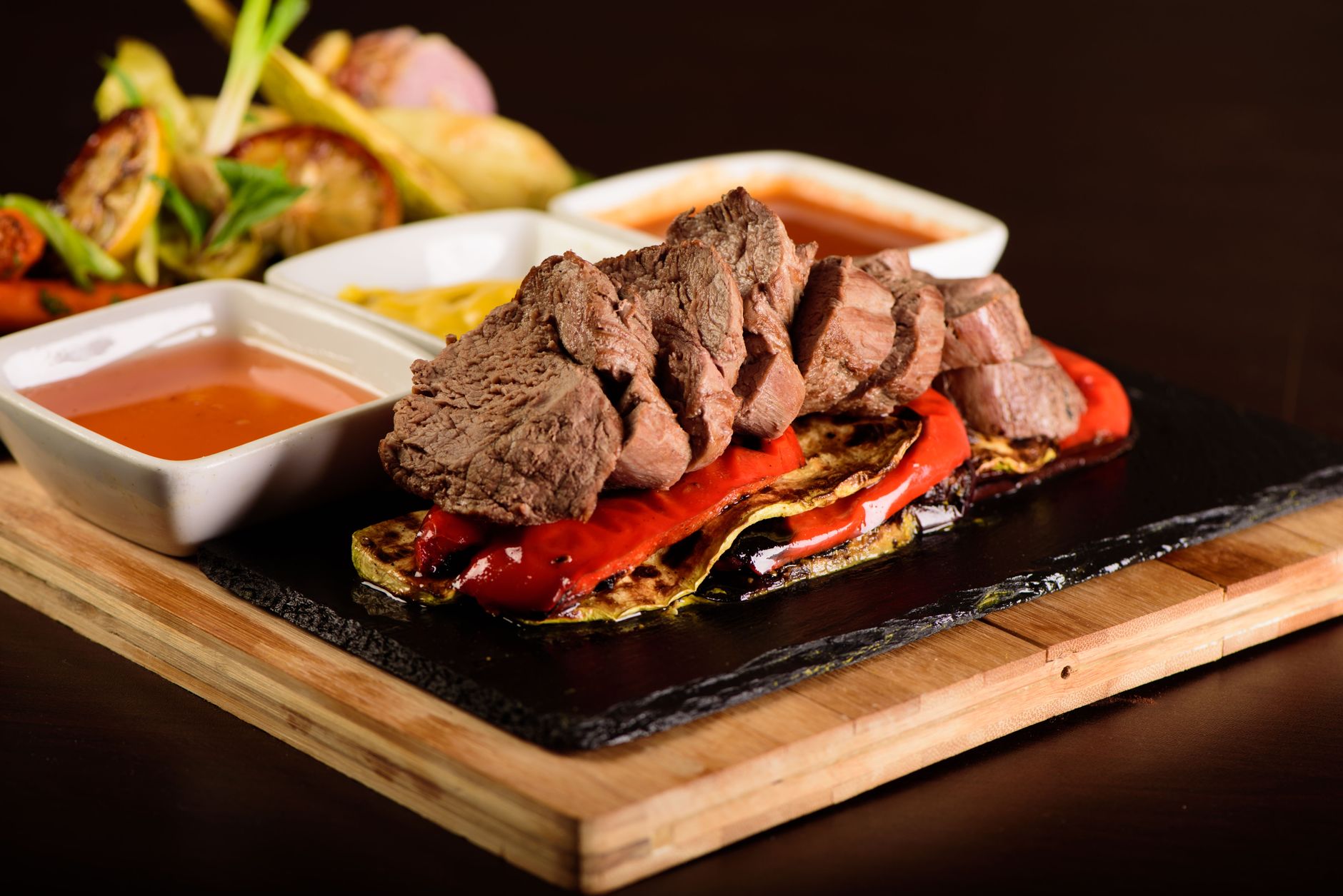 How to plate a steak beautifully with sauces and roasted vegetables?