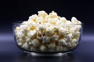 Is popcorn considered a safe low-FODMAP snack for people with sensitive stomachs?