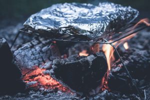 What are easy foil packet dinners you can cook directly on hot coals?