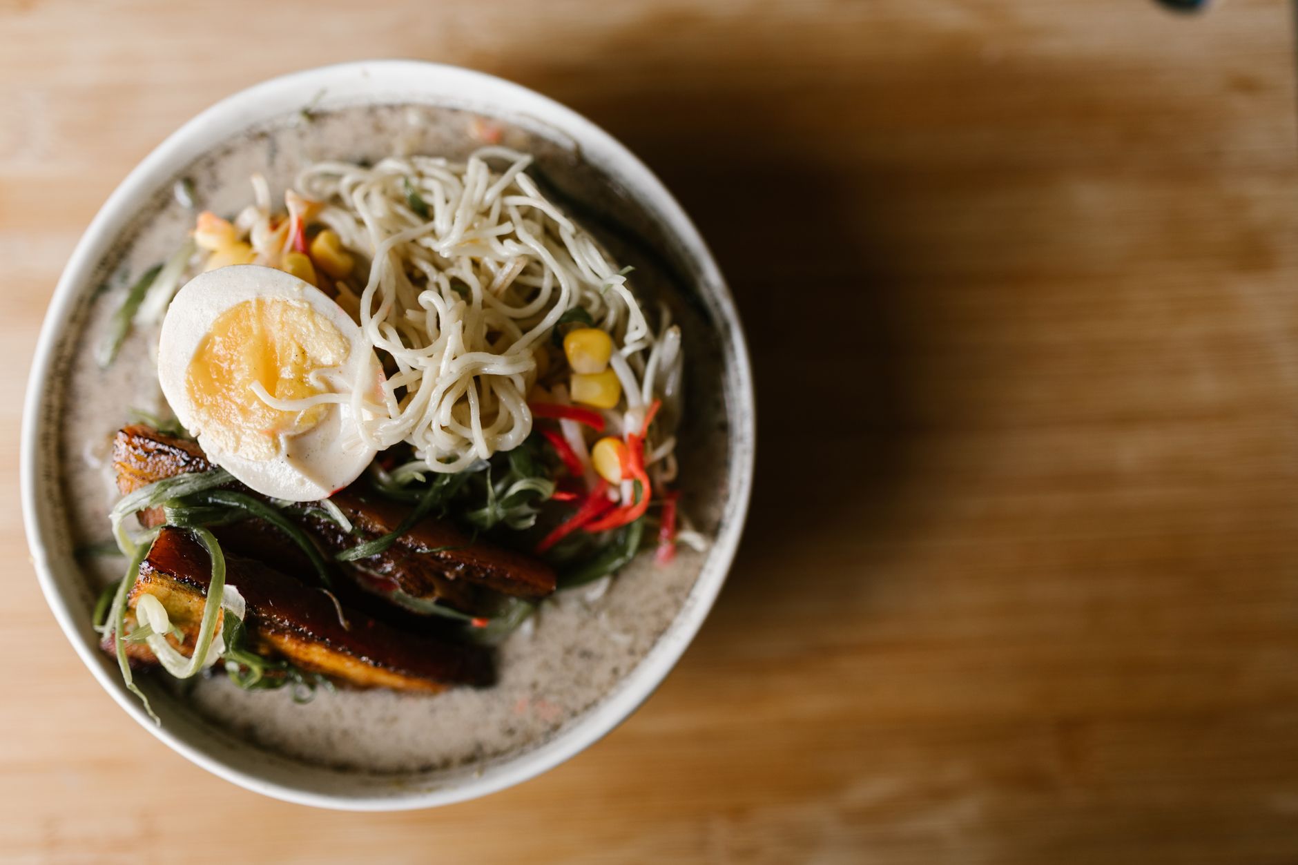 How to upscale instant ramen into a gourmet single meal under 5 dollars?