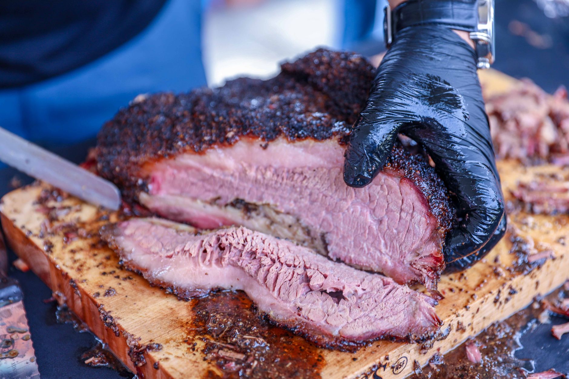What is the difference between Texas style smoked brisket and Kansas City BBQ?